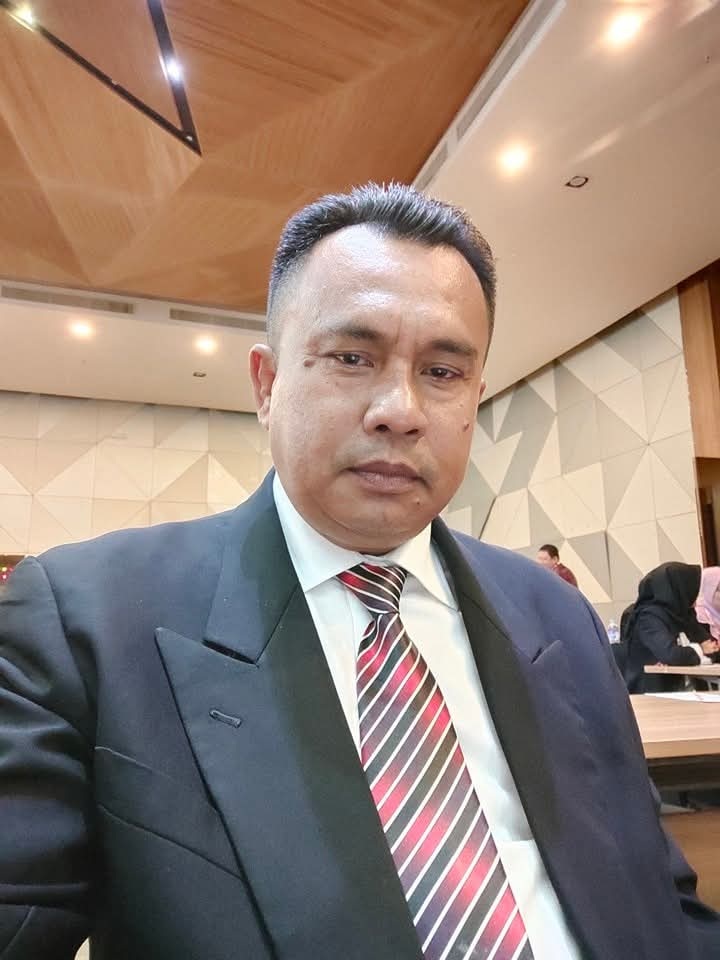 Hasibuan.