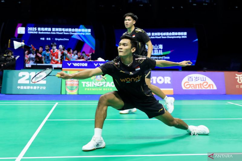 MENANG: Ganda putra Indonesia Muhammad Shohibul Fikri/Daniel Marthin saat melawan ganda Malaysia Man Wei Chong/Kai Wun Tee pada pertandingan grup B Kejuaraan BAMTC 2025, di Conson Gymnasium, (13/02).