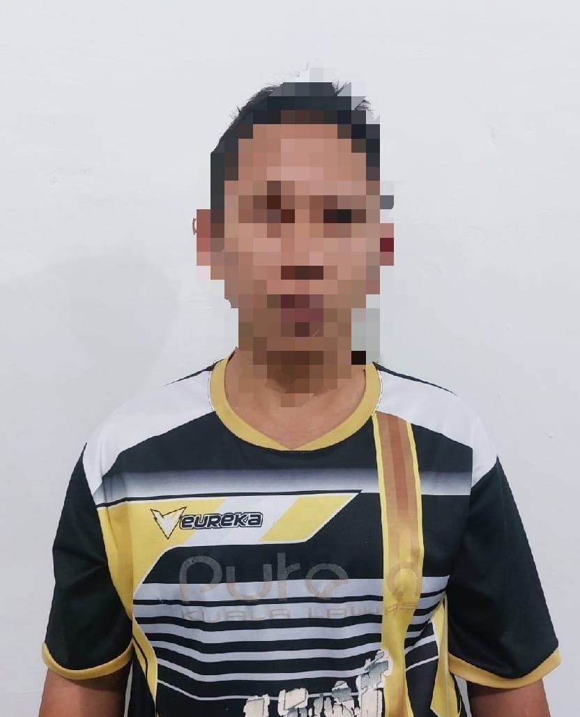 Tersangka K.