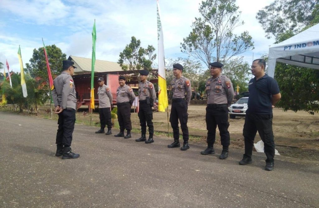 LANCAR: Polres Sanggau memastikan ritual Nosu Minupodi XII di Rumah Betang Raya Dori&rsquo; Mulor berjalan lancar.
