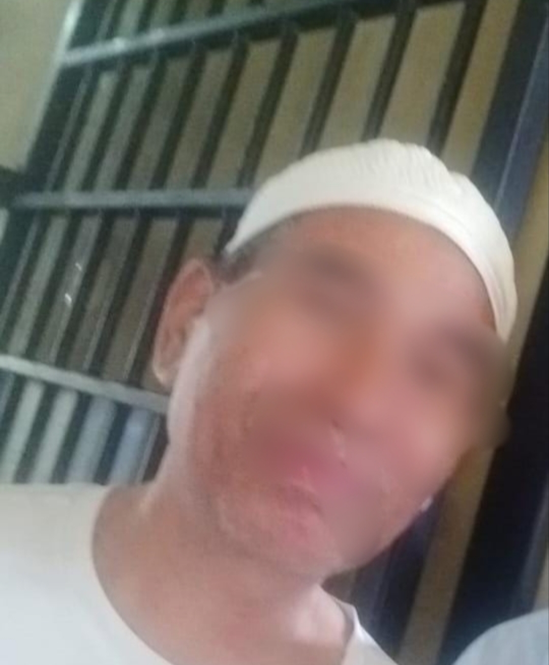 Tersangka AK saat di tahanan.