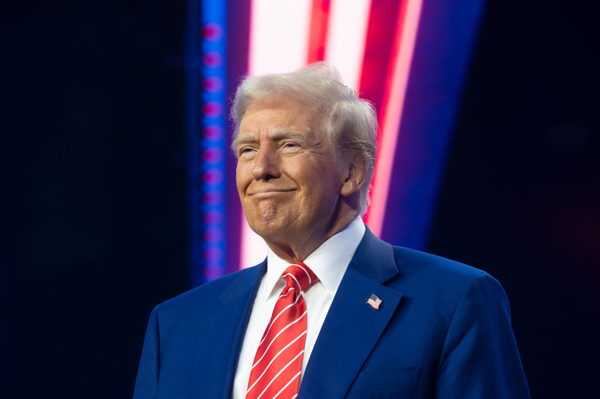 PHOENIX, ARIZONA - DECEMBER 22: U.S. President-elect Donald Trump smiles during Turning Point USA