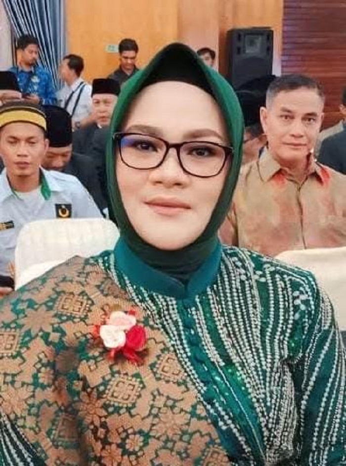 Purnawati, SH