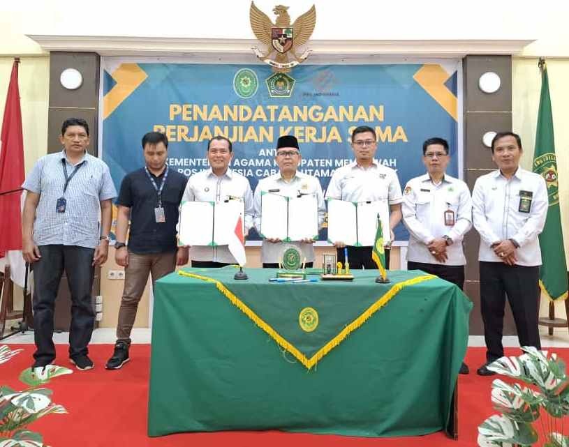 TANDA TANGAN: Penandatanganan MoU antara Kemenag, PA dan PT POS Indonesia.