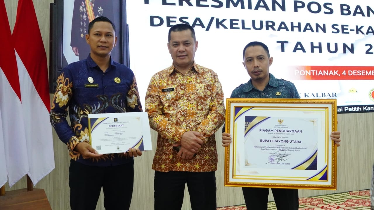 PERESMIAN: Bupati KKU Romi Wijaya Pembentukan Pos Bantuan Hukum (Posbankum) Desa se-Kabupaten Kayong Utara dalam kegiatan peresmian Posbankum se-Kalimantan Barat.