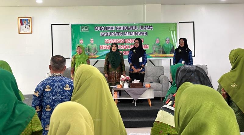 SOSIALISASI: suasana sosialisasi bencana dan reproduksi pasangan subur