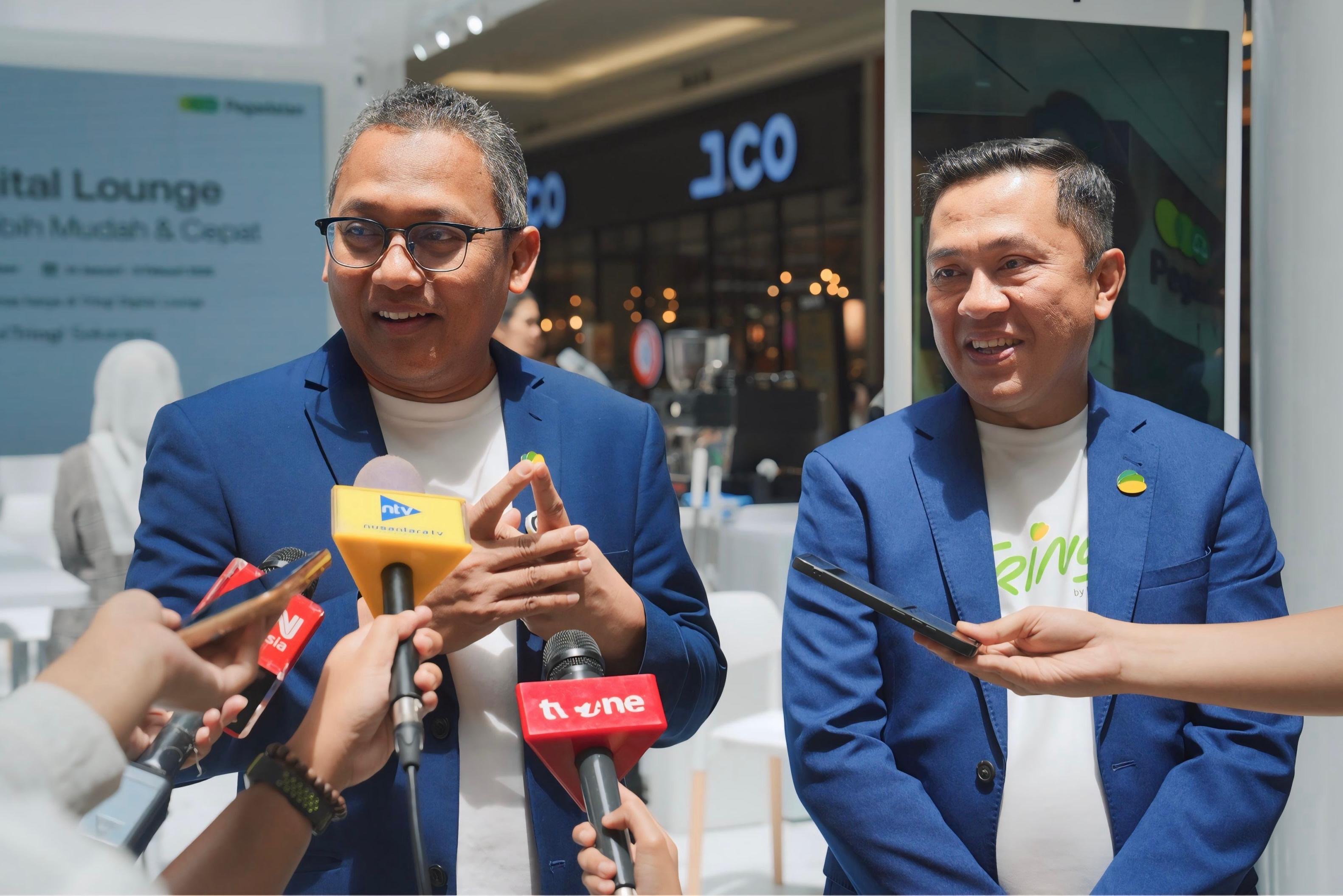 Keterangan pers terkait integrasi layanan digital melalui aplikasi Tring! sebagai langkah percepatan transformasi digital.