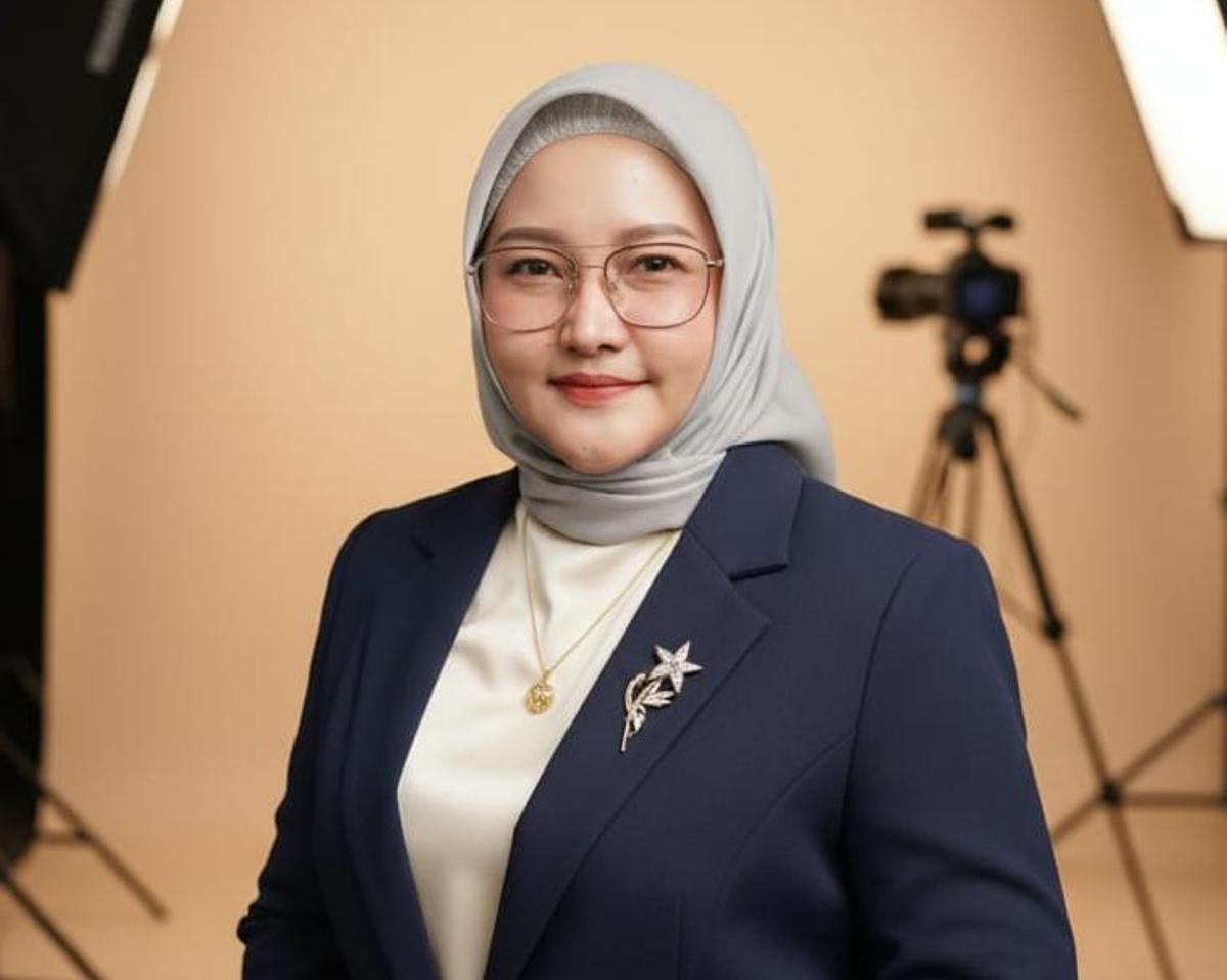 Dr. Herwulan Irine Purnama, M.Pd.