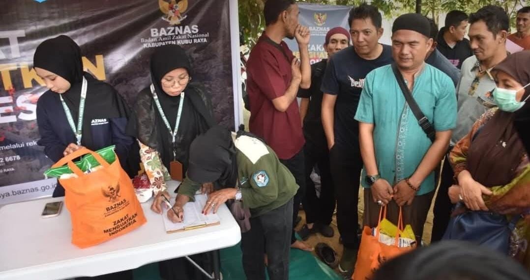 RAMADAN BAHAGIA: Baznas Kubu Raya melalui program Ramadan Bahagia menyalurkan bantuan 200 paket sembako kepada para mustahik.