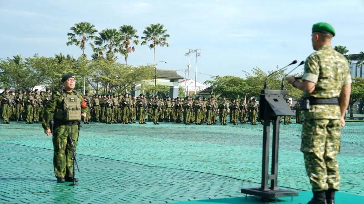 UPACARA: Suasana upacara penyambutan purna tugas Satgas Pamtas RI–PNG Mobile Yonif 644/Walet Sakti di Lapangan Tidayu Makodam XII/Tanjungpura, Selasa (7/4). 