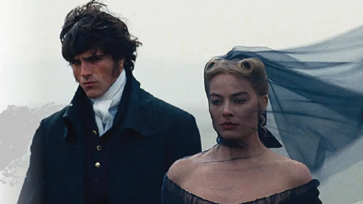 Heathcliff (kiri, Jacob Elordi) dan Catherine (Margot Robbie) bertemu kembali setelah bertahun-tahun. Catherine kini sudah menikah dan berada di ambang kegalauan serta rasa bersalah saat bertemu Heathcliff. (WARNER BROS PICTURES)