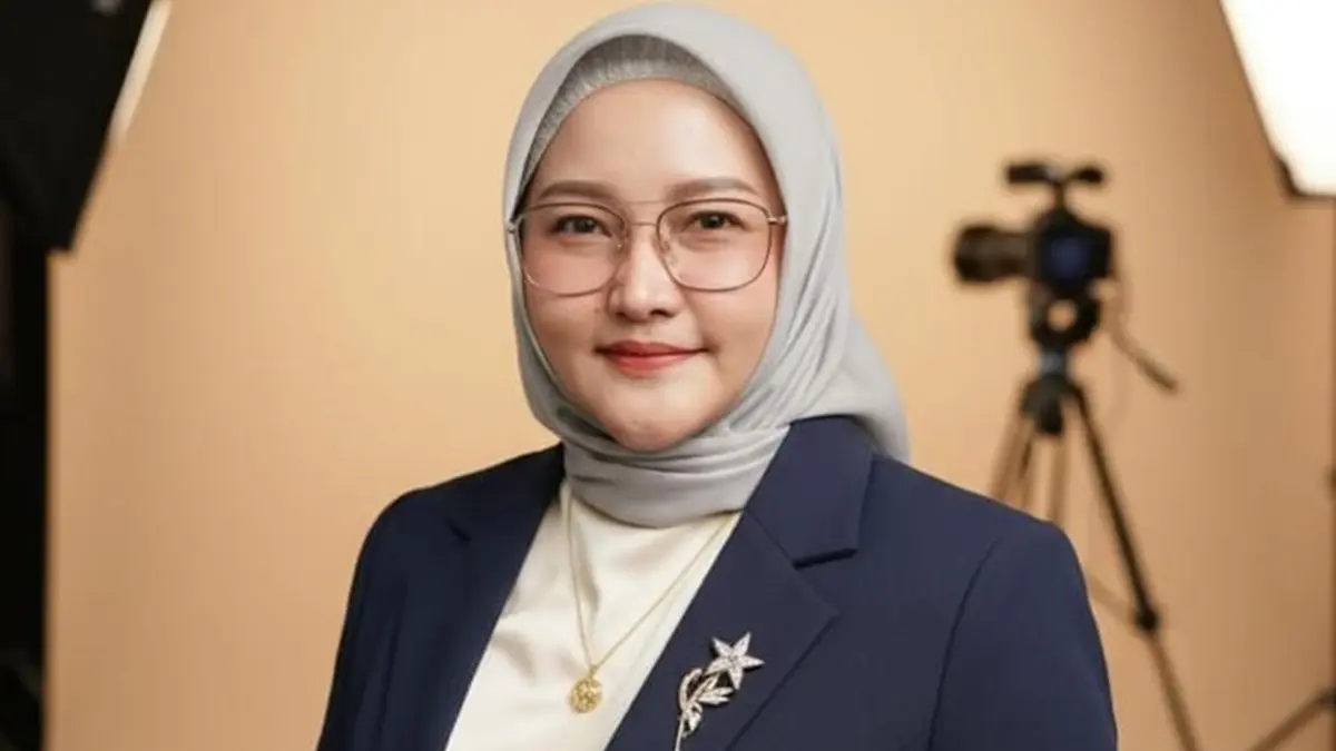 Dr. Herwulan Irine Purnama, M.Pd