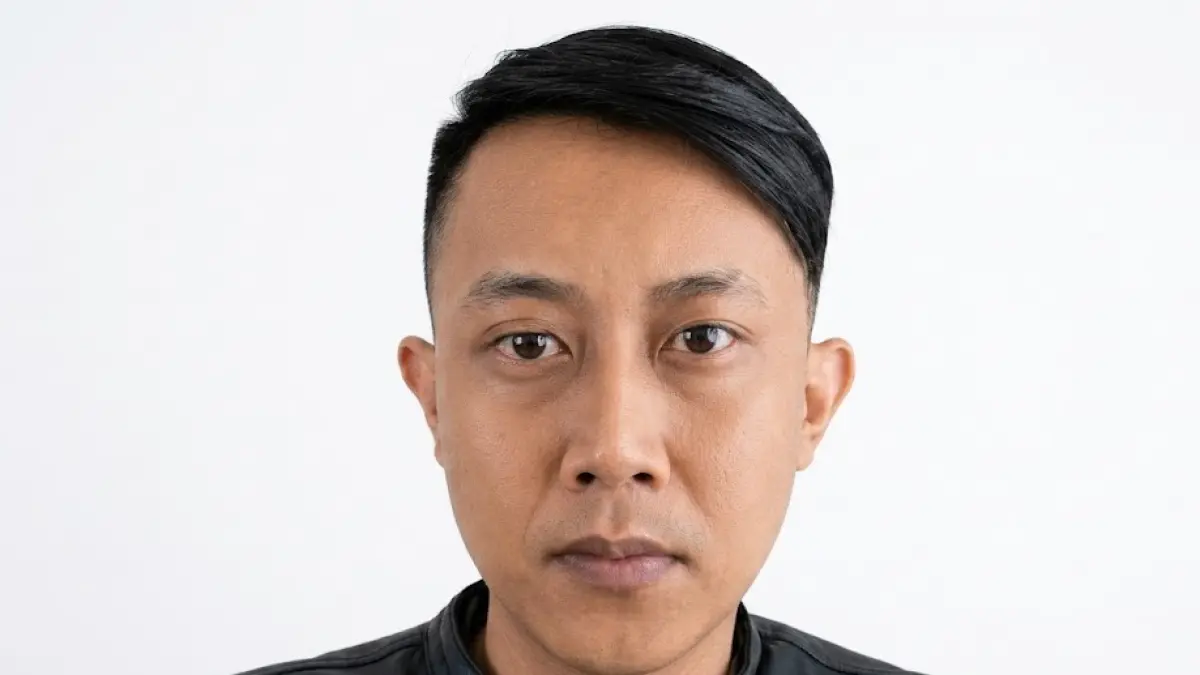 Wajah Taufik Hidayat, tersangka kasus penyekapan dan penganiayaan berat terhadap perempuan di Bandung yang telah ditangkap Polda Jawa Barat.