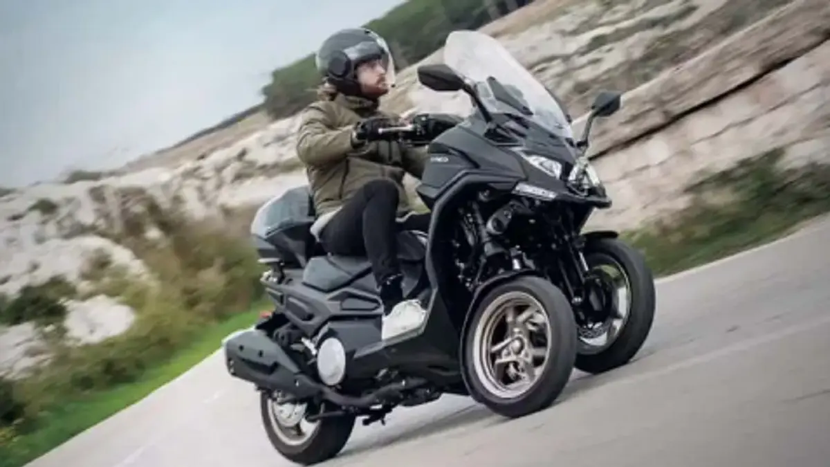 Kymco CV3 575i memadukan mesin dua silinder 574 cc dengan konfigurasi tiga roda dan teknologi suspensi miring (leaning suspension). (KYMCO)