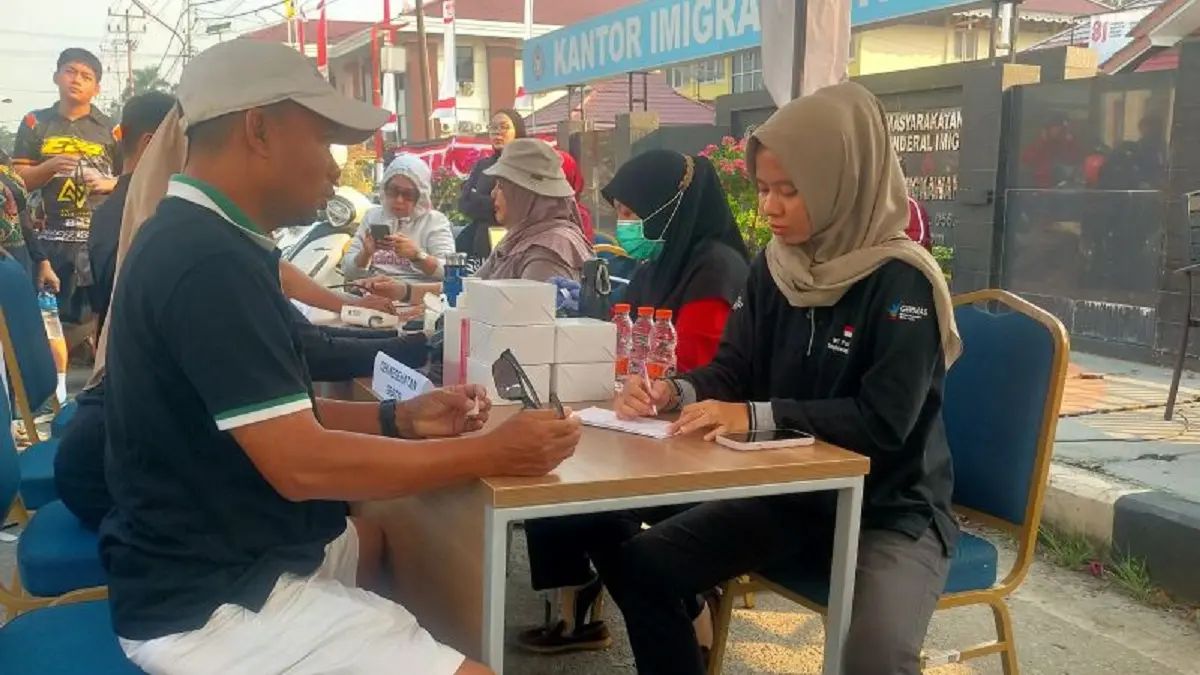 Program Pasporia yang digelar di kawasan Car Free Day (CFD) Jalan Firdaus, Kelurahan Pasiran, Kecamatan Singkawang Barat, Minggu (9/8). (ANTARA/Narwati)