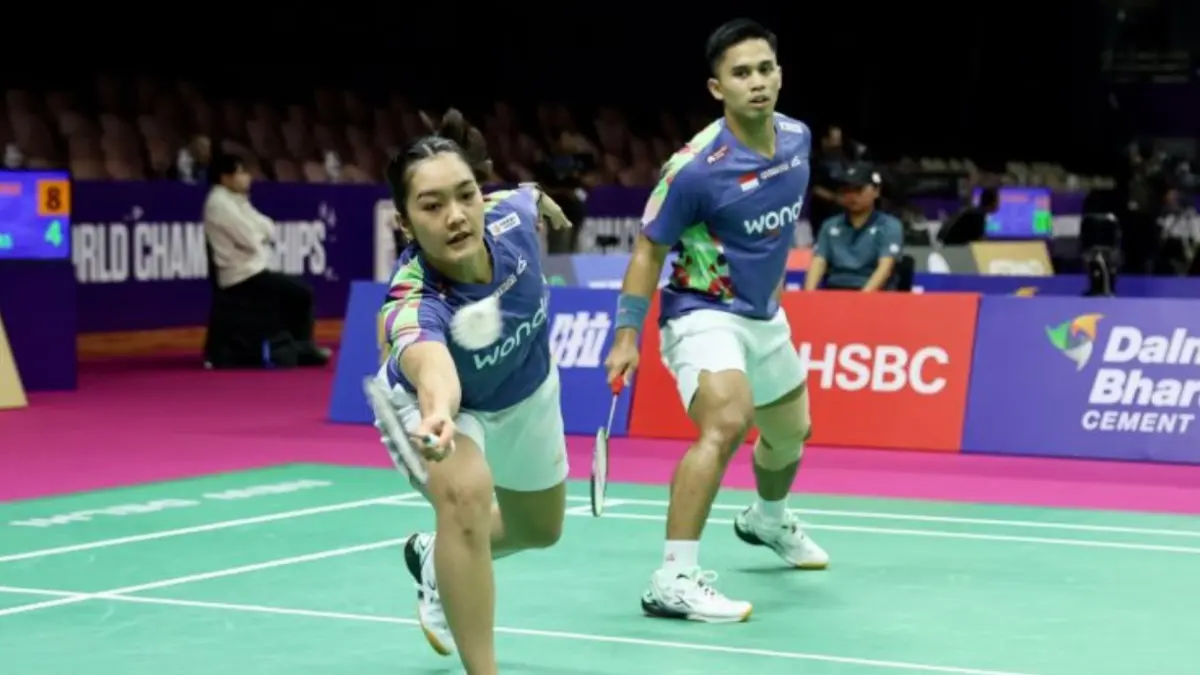 Ganda campuran Indonesia Amri Syahnawi/Nita Violina Marwah saat melawan pasangan Turki Emre Sonmez/Yasemen Bektas pada babak 32 besar Kejuaraan Dunia BWF 2026 di New Delhi, India, Rabu (19/8). Amri/Nita menang dua gim langsung 21-14, 21-10. (ANTARA/HO-PBSI)