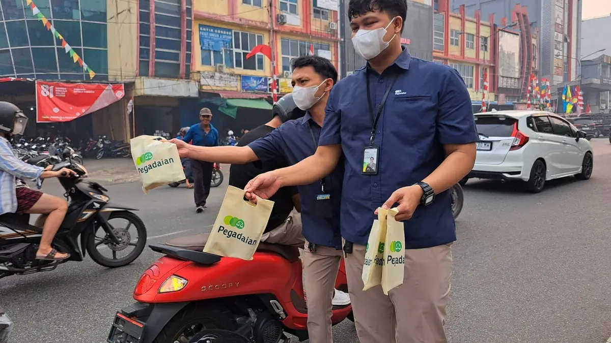Pegadaian Bagikan 2.400 Masker dan Suplemen di Pontianak