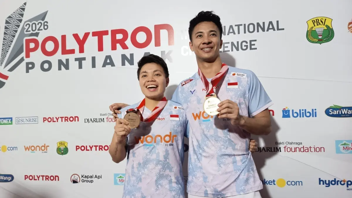 Pasangan ganda campuran pebulutangkis Indonesia Ferdinansyah/Apriani Rahayu meraih juara di ajang Polytron Pontianak International Challenge pada Minggu (30/8). (ISTIMEWA)