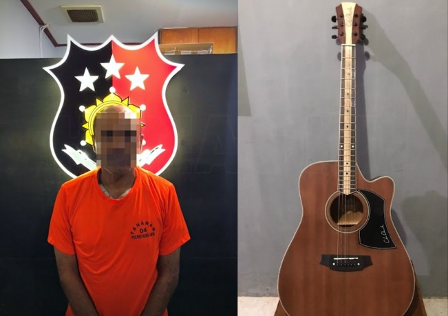 ISTIMEWA DIAMANKAN: Residivis kambuhan, AS bersama satu unit gitar yang dicurinya dari sebuah rumah di Jalan Adisucipto,