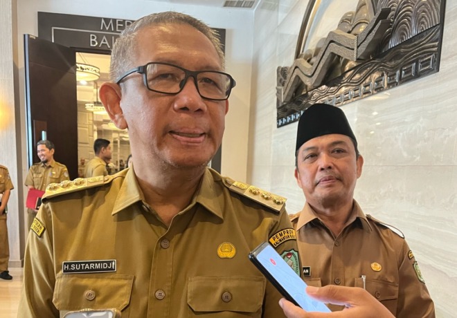 Sutarmidji dan Ria Norsan.