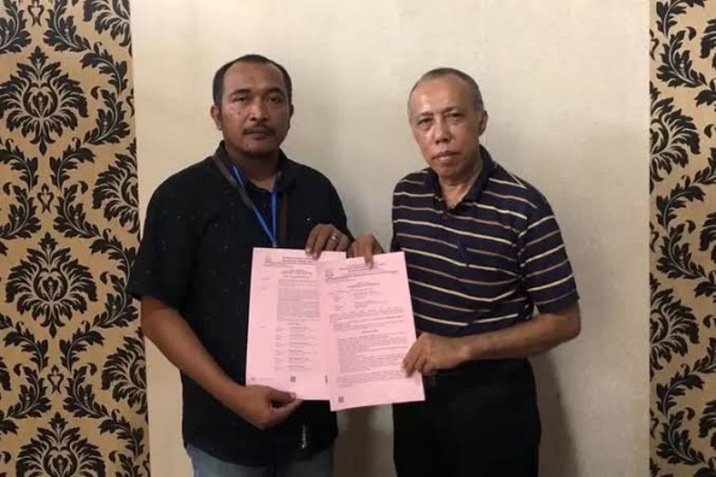 TETAP TERIMA GAJI: Terpidana Sirajudin (kanan) saat dieksekusi di Lapas Mataram, belum lama ini. (DOK/LOMBOK POST)