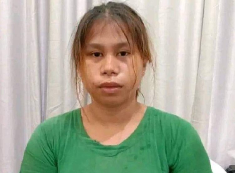 Pelaku pembunuhan sadis di Boltim Arnita Mamonto usai diperiksa penyidik Polres Boltim(Dok. Istimewa)