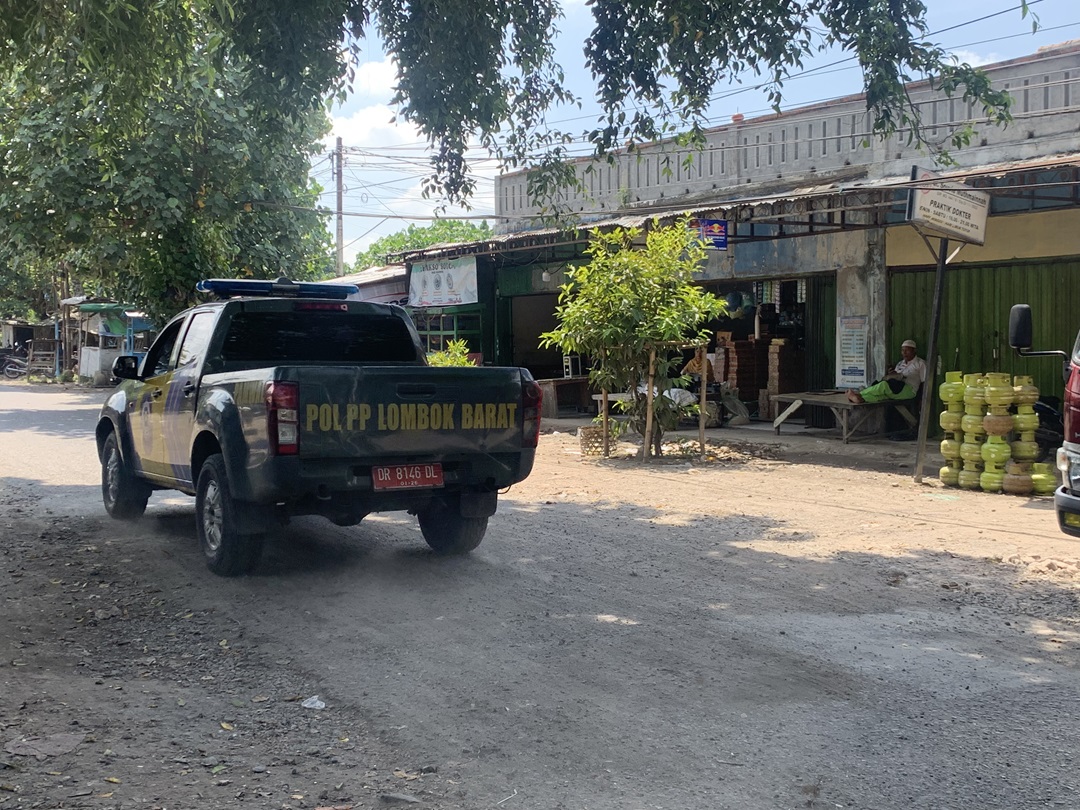 PERBAIKAN : Jalan rusak yang ada di Kuripan kini sudah mulai mulus.(CHIA/LOMBOK POST)