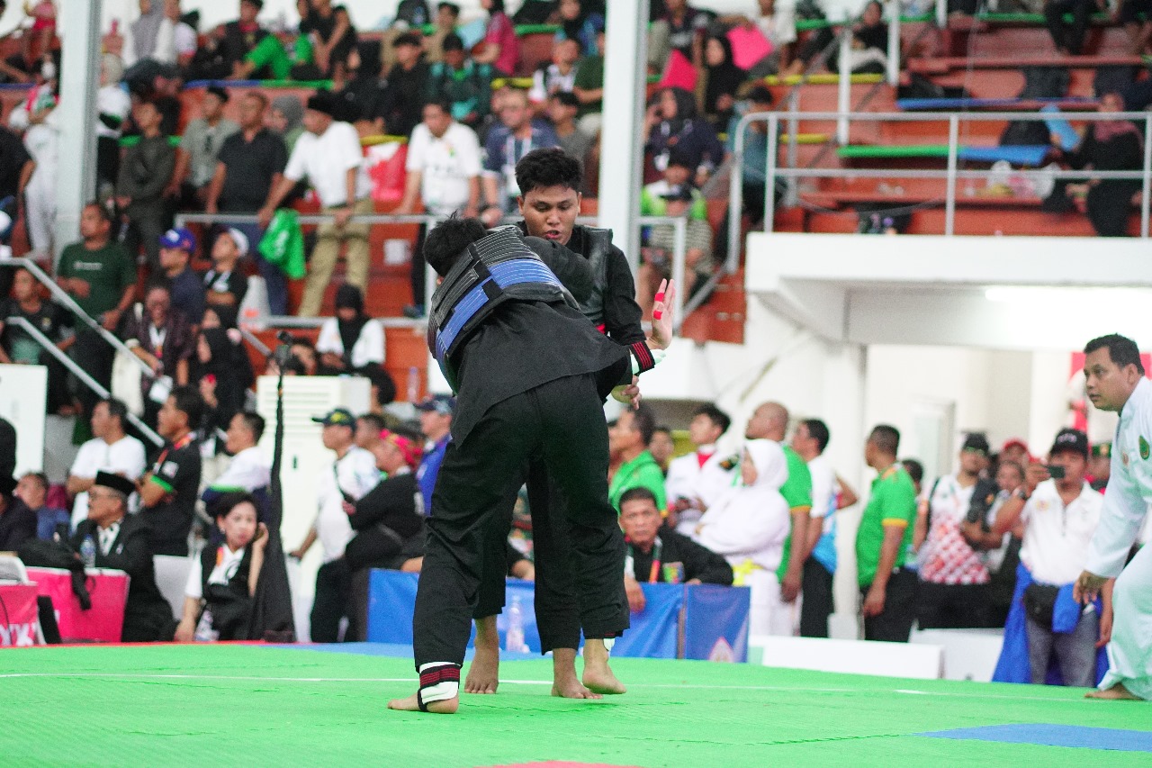 Pesilat putra NTB M Padil Anwar meraih medali perak di Kelas H, PON XXI Aceh-Sumatera Utara/2024.