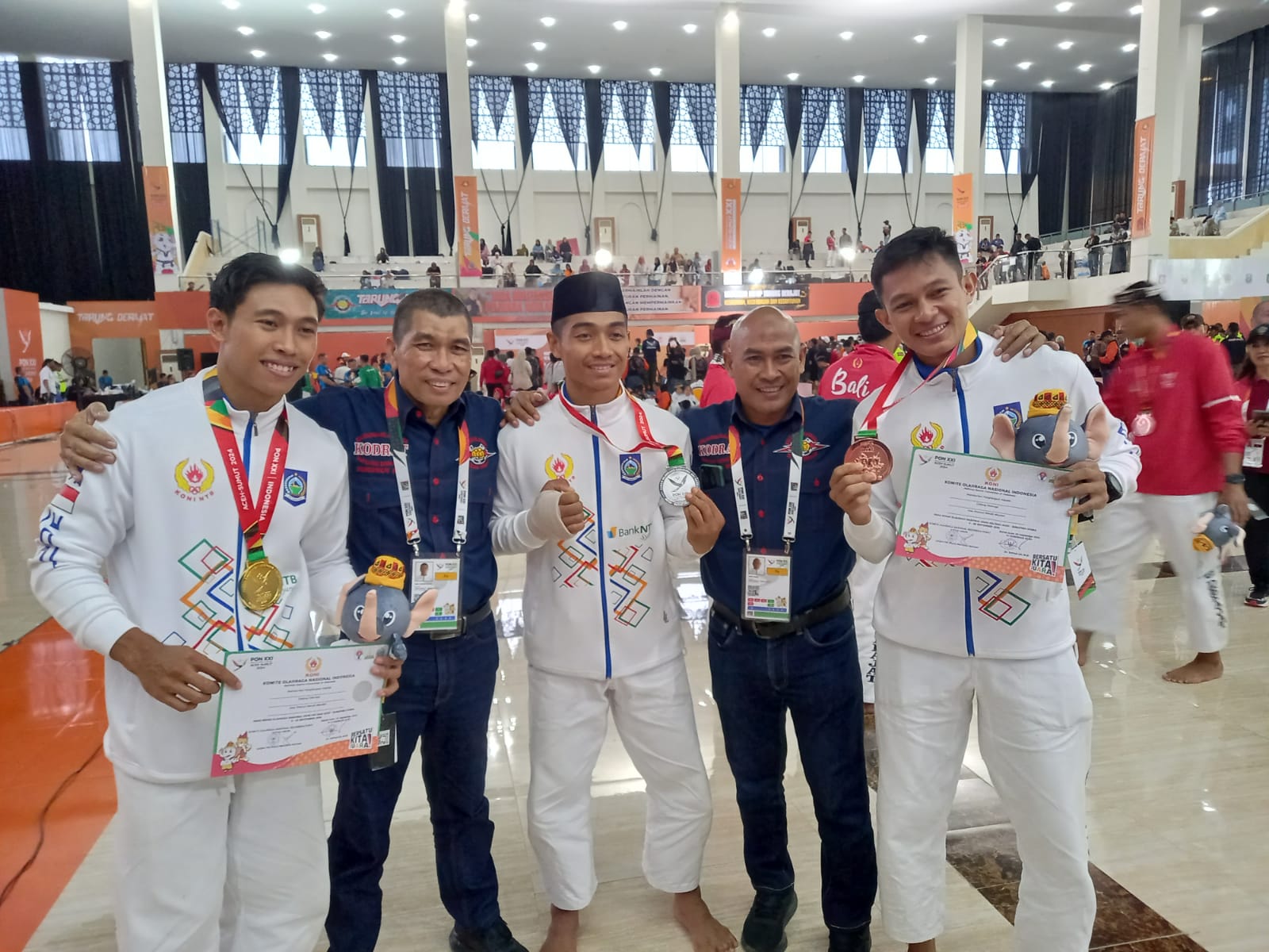 DUA EMAS: Cabor tarung derajat berhasil meraih dua medali emas di PON XXI Aceh-Sumatera Utara/2024. (Dok. Koni NTB)