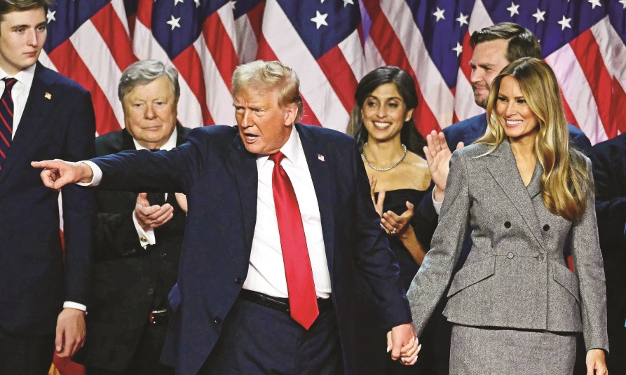 BERI ANCAMAN: Presiden terpilih AS Donald Trump bersama istri Melania Trump saat pemungutan suara Pilpres AS beberapa waktu lalu.