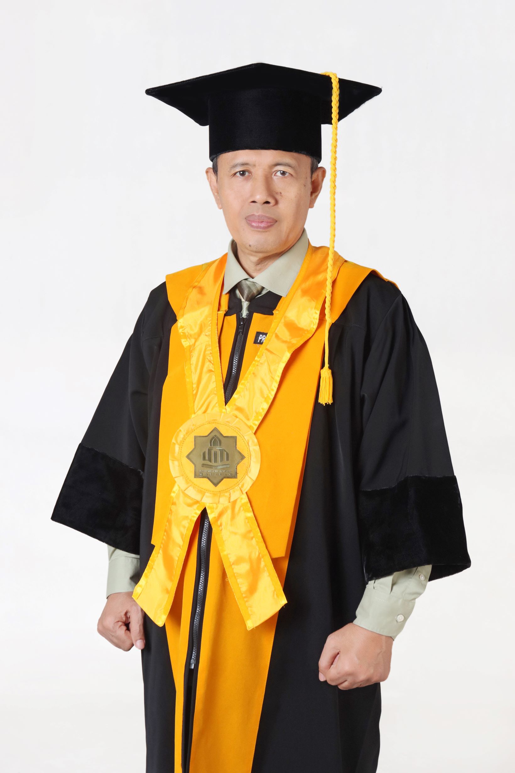 Prof. Dr. Syamsul Arifin, M.Ag