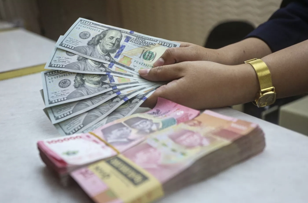 Rupiah Melemah Tipis Terhadap Dolar AS pada 27 Mei 2025, Diprediksi Masih Akan Fluktuatif. (Foto: Jawa Pos)