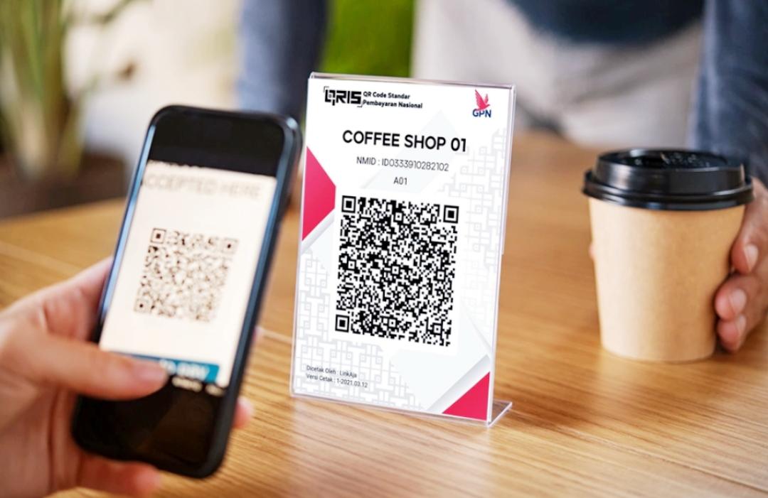 Bukan hanya jago kandang, Quick Response Code Indonesian Standard (QRIS) sekarang telah berhasil tembus ASIA, bukti teknologi digital Indonesia diakui dunia.