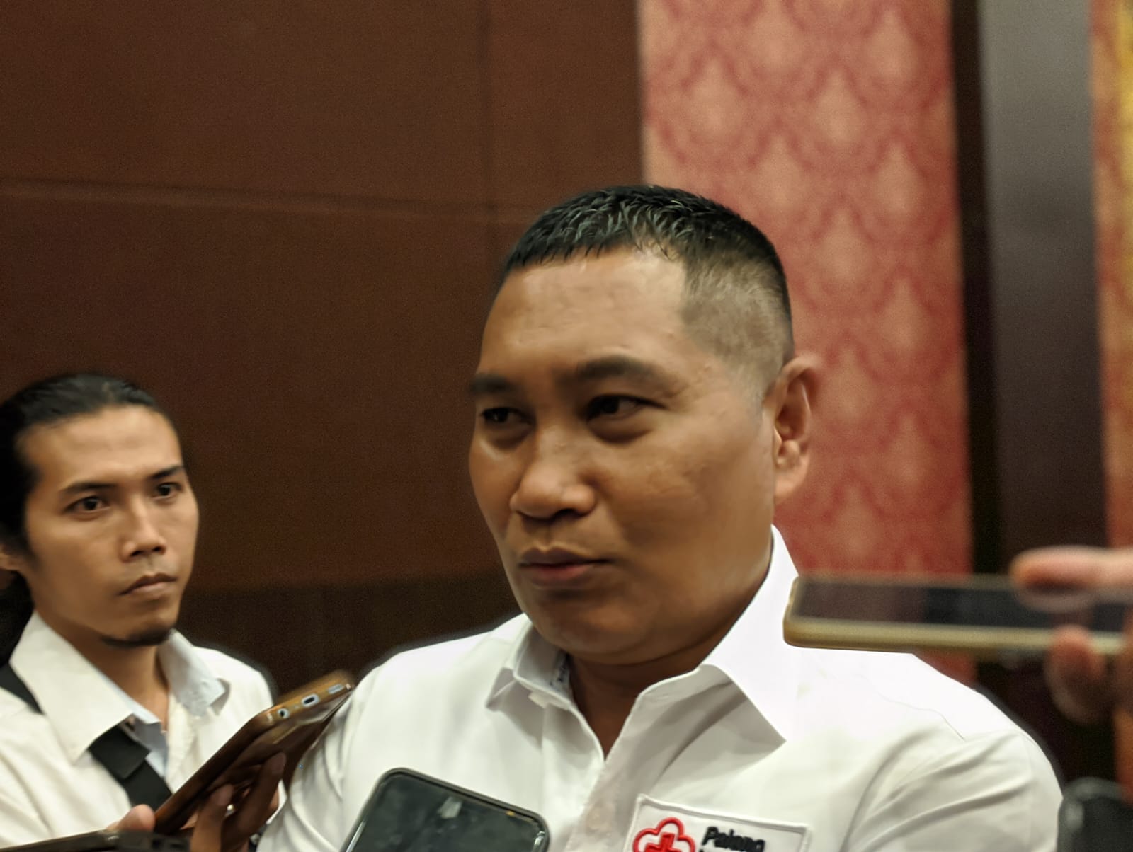 dr. H Lalu Herman Mahaputra