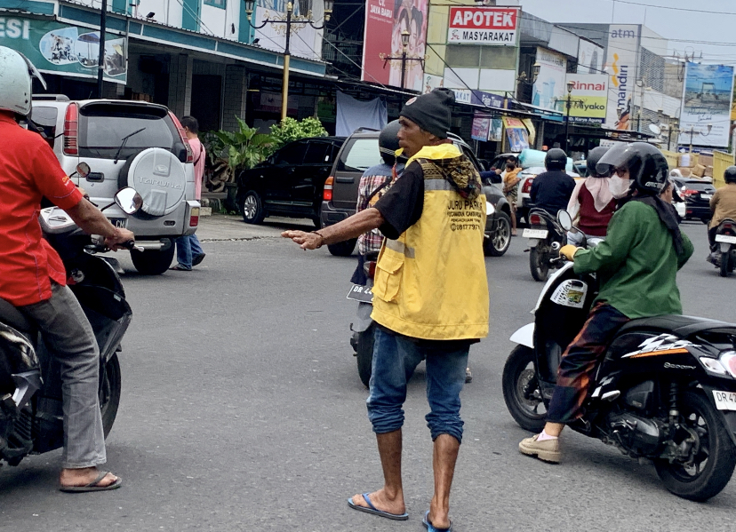 Jukir di Cakra