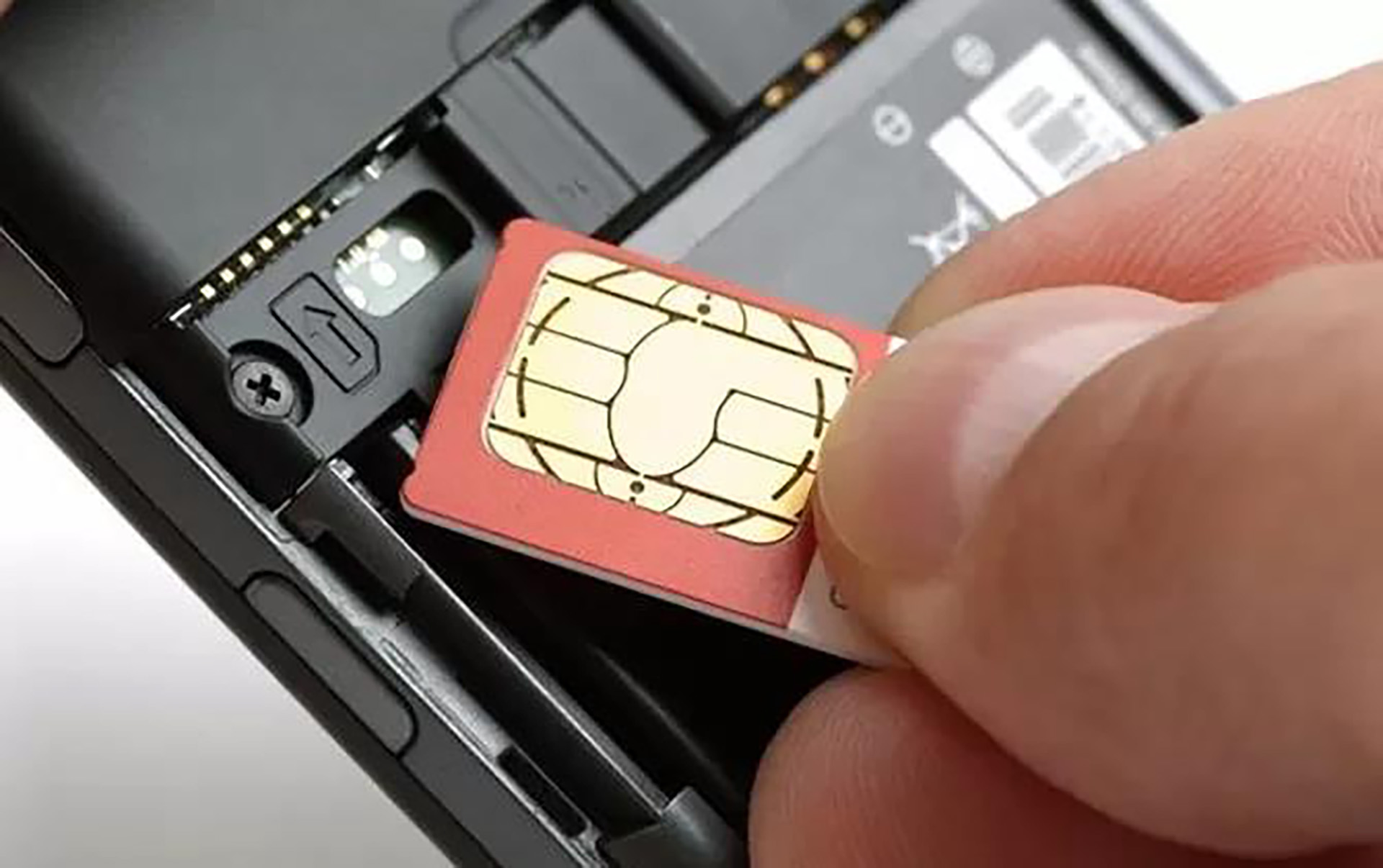 Ilustrasi SIM card dengan KK dan NIK.