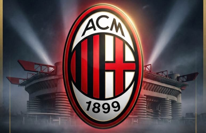 Loga AC Milan dengan latar Stadion San Siro.