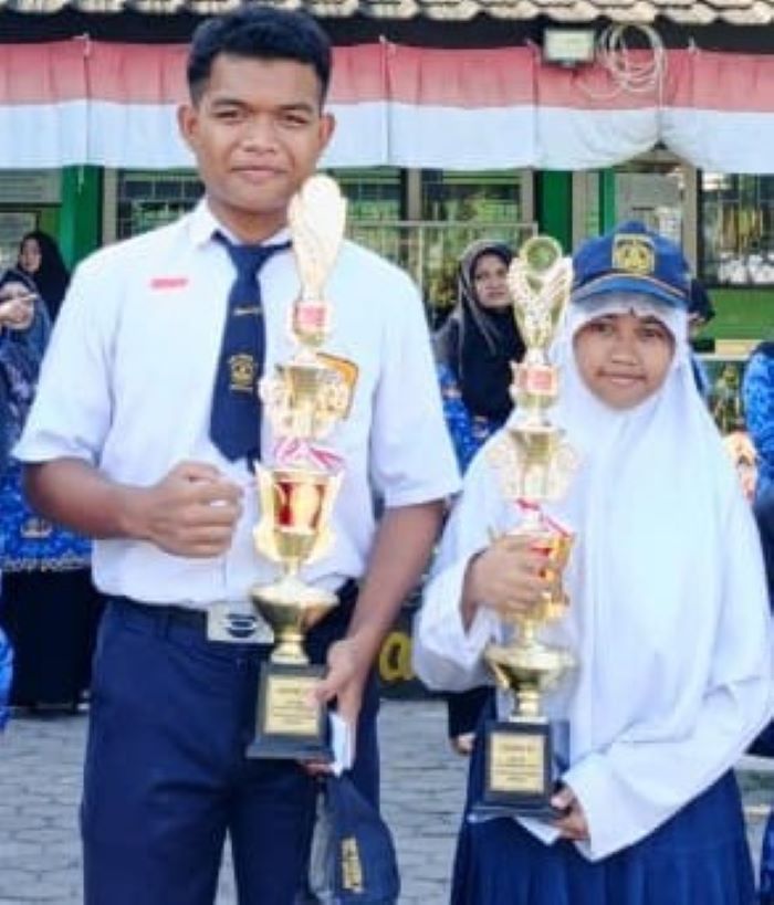 Siswa SMPN 10 Mataram Jeny Marwah Mindari dan Hafizul Khoir meraih Juara III Tahfidz dan Qori STQ Pelajar 2025.