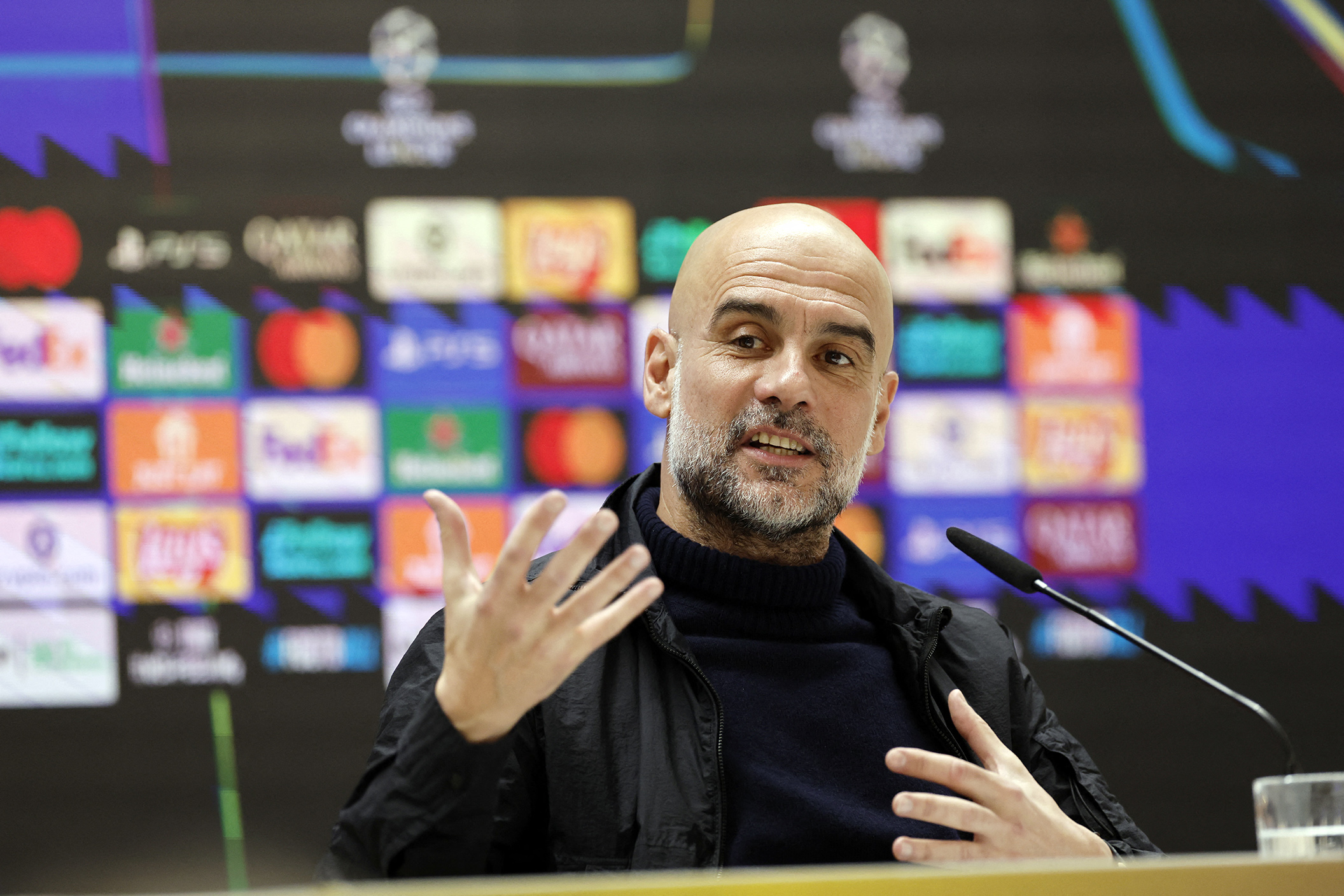 Pelatih Manchester City Josep Guardiola dalam sesi konferensi pers jelang laga Manchester City kontra Real Madrid.(Oscar DEL POZO/AFP)