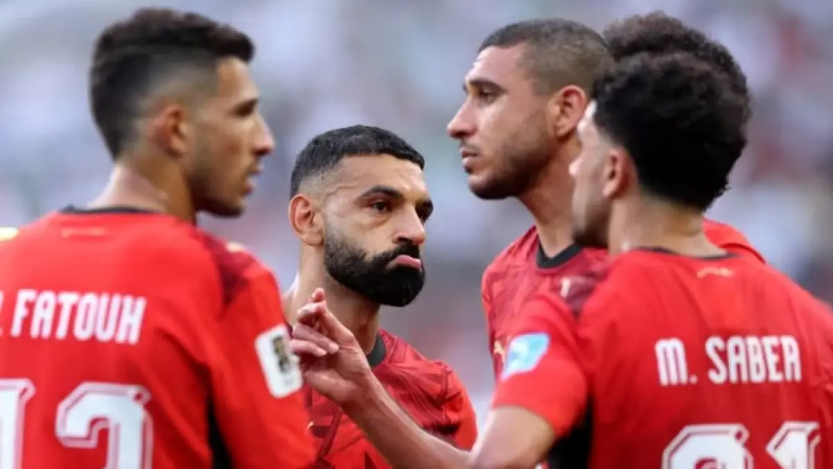 Mesir berhasil lolos ke babak 32 besar usai bermain imbang dengan Iran di pertandingan terakhir fase grup. (FIFA)