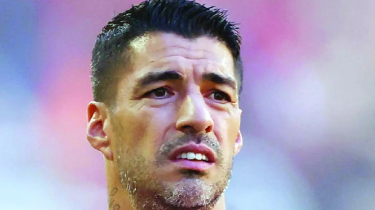 Luis Suárez menyuarakan dukungannya kepada pemain Muslim yang memilih menutupi logo minuman beralkohol saat menerima penghargaan di Piala Dunia. (Istimewa)