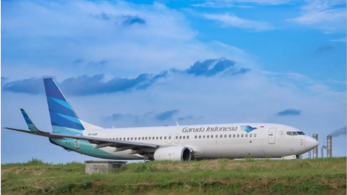 BAGASI: Tampak Pesawat Garuda Indonesia di bandara internasional Soekarno Hatta. Per 1 September 2026, Garuda mengubah aturan bagasi. (BAY ISMOYO / AFP)