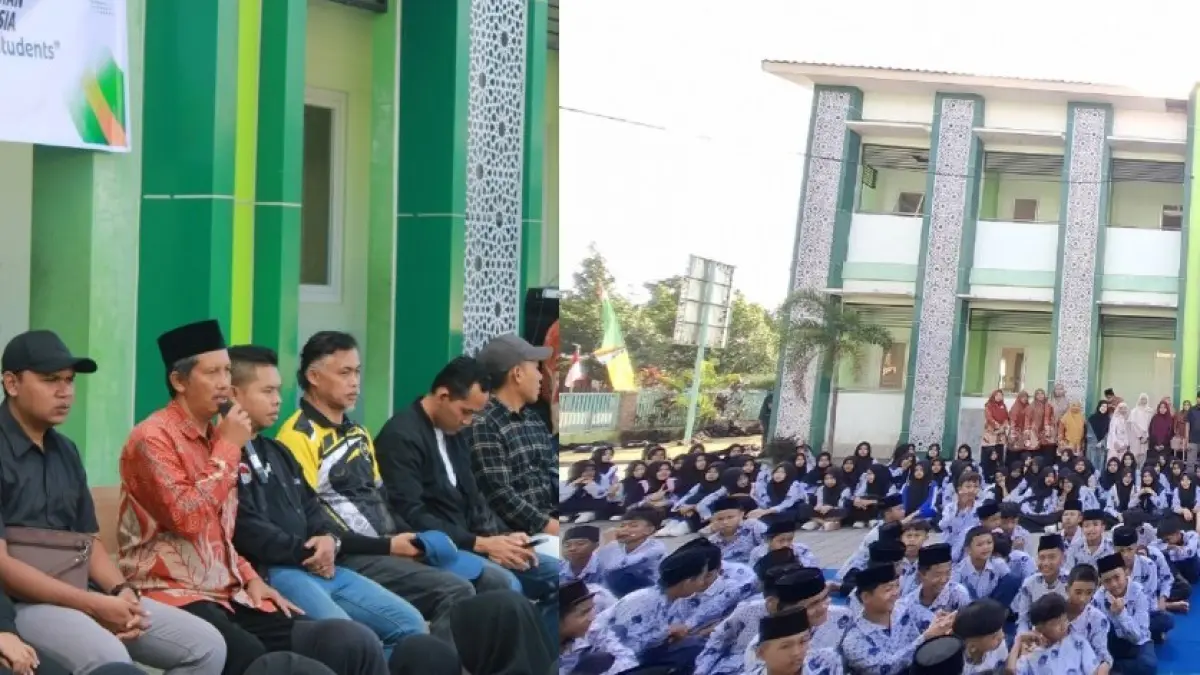 BERIKAN SAMBUTAN: Kepala MTsN 2 Lombok Barat H Abdul Azis Faradi (pegang mik) memberikan sambutan pada kunjungan akademik dari Universiti Sultan Zainal Abidin (UniSZA) Malaysia, Kamis (6/8). MTsN 2 Lombok Barat perkuat kolaborasi internasional bersama UniSZA Malaysia.