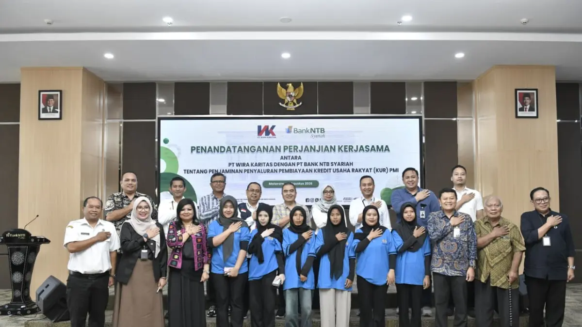 Bank NTB Syariah secara resmi menjalin kerja sama dengan PT Wira Karitas dalam penjaminan penyaluran pembiayaan Kredit Usaha Rakyat (KUR) bagi Pekerja Migran Indonesia (PMI), Rabu (19/8/2026).