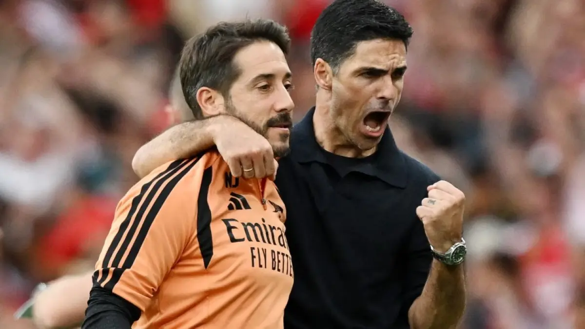 Manajer Arsenal Mikel Arteta (kanan) merayakan kemenangan ata Chelsea di Liga Inggris. (ARSENAL.COM)