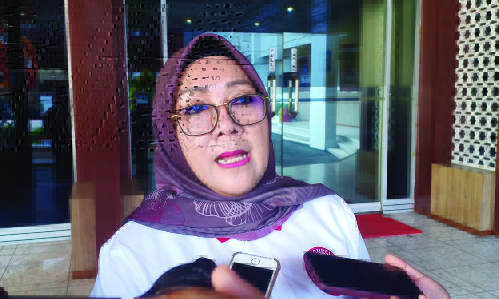 Hj Putu Selly Andayani