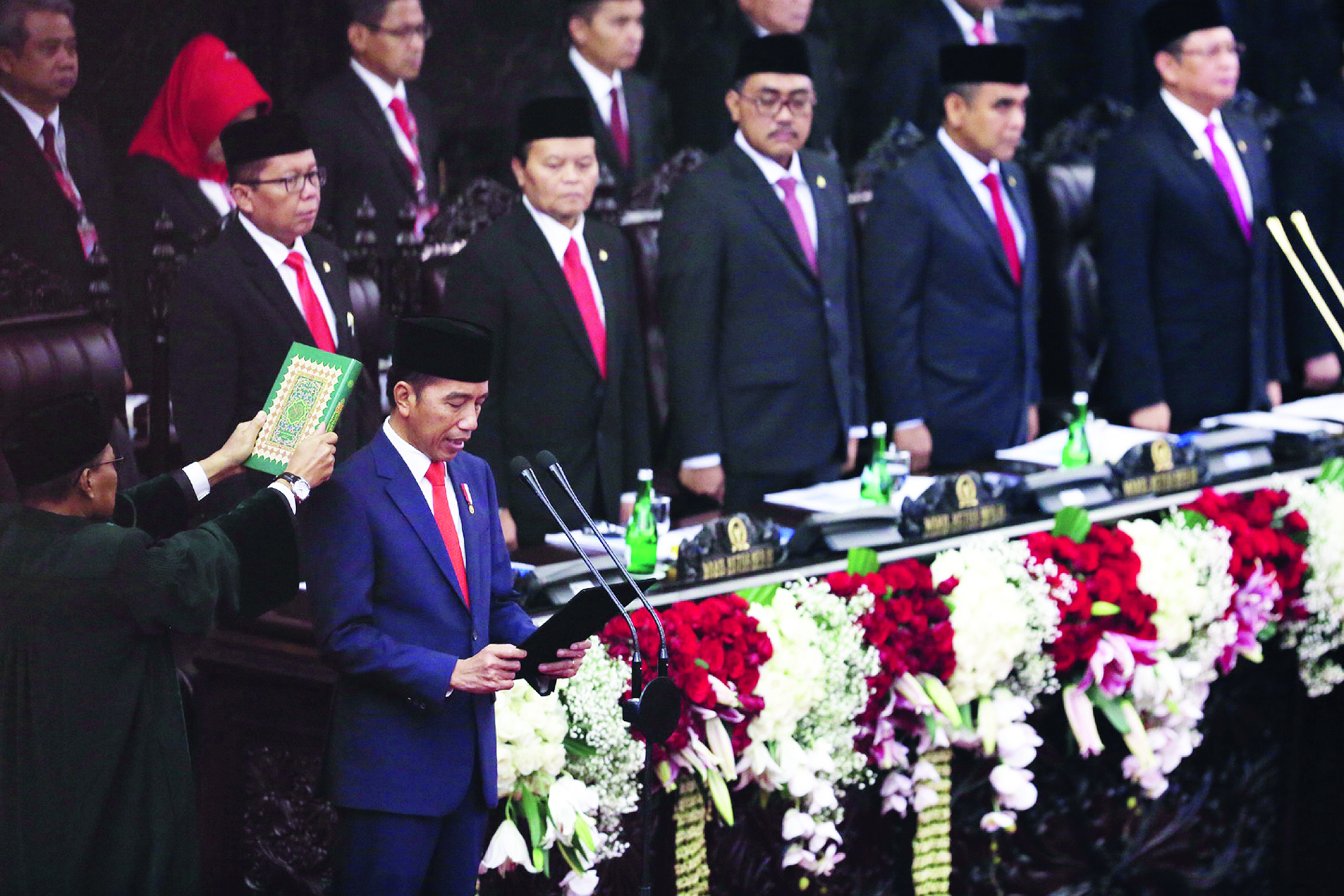 Joko Widodo saat pengucapan sumpah jabatan menjadi presiden periode 2019-2024 di Gedung Nusantara, kompleks Parlemen, Senayan, Jakarta, Minggu (20/10/2019). HARITSAH ALMUDATSIR/JAWA POS