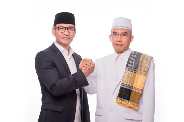 H Mohan Roliskana bersama TGH Mujiburrahman