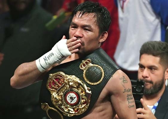 Manny Pacquiao akan diberi gelar juara seumur hidup oleh badan tinju dunia WBA. ( Ethan Miller/Getty Images/AFP)