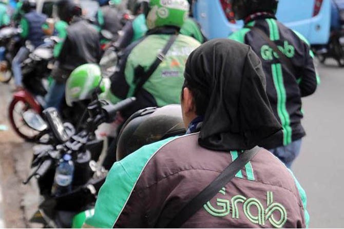 Tarif Grabb baru telah dihitung secara saksama sesuai dengan aturan pemerintah, namun juga dirancang untuk menjaga kesejahteraan para mitra pengemudi di tengah kenaikan harga BBM. (Foto: Dok JawaPos.com)